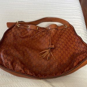 Gently used Gucci Hobo Bag serial numbers 223951 204991 Gucci made in Italy